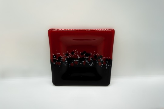 Dramatic red and black side plate.